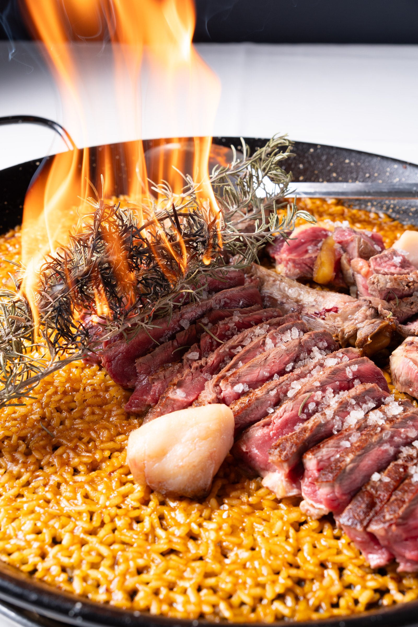 Arroz seco con chuletón – detalle