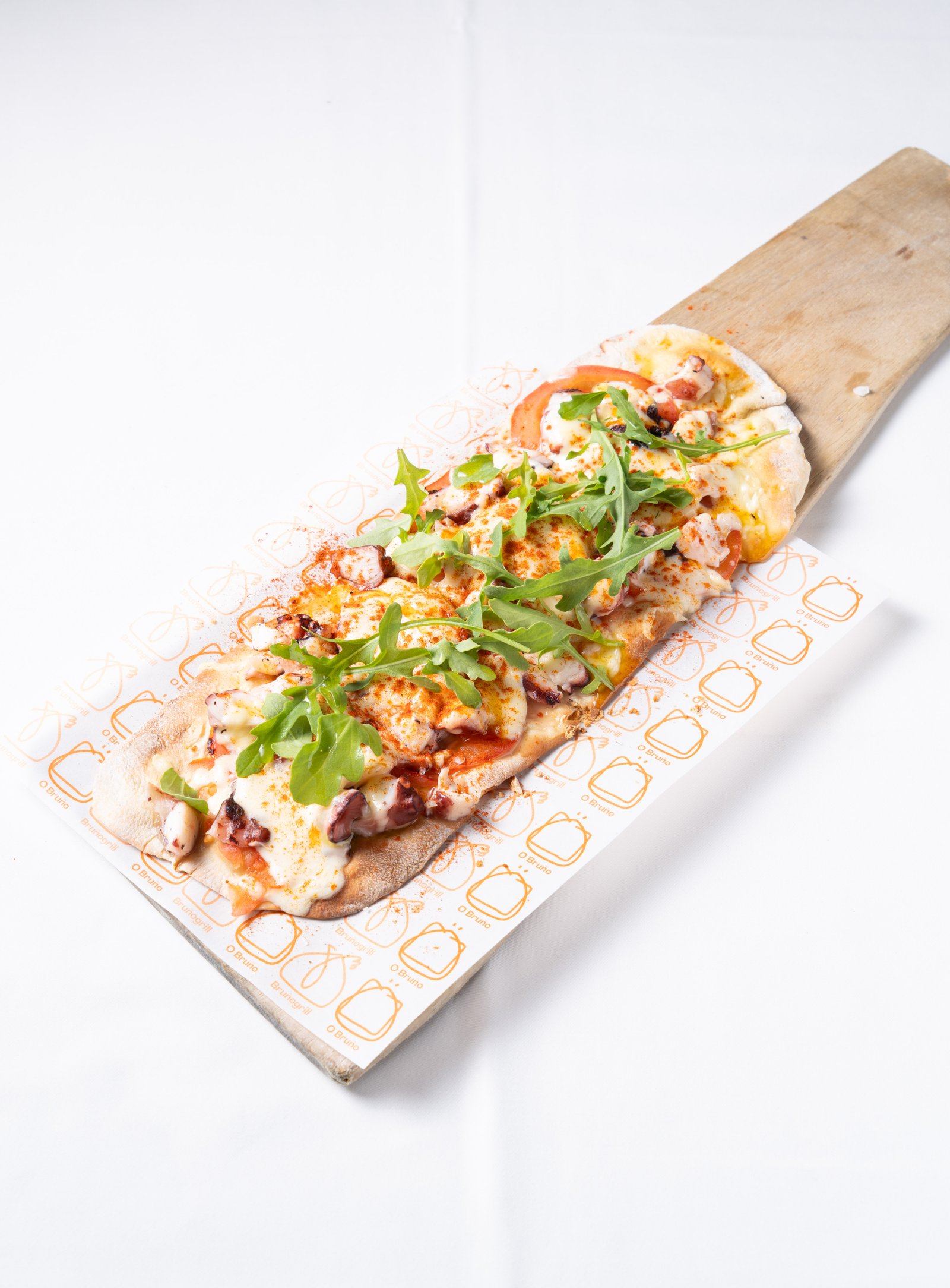 Chalana de pulpo con queso país y rúcula – detalle 3